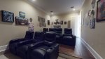 Theater Room Furnished with Vintage Movie Memorabilia, Smart TV and Intense Sound System